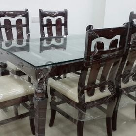 Heavy teakwood dining table directly from the makers