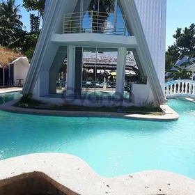 Quattro house in the middle of the swimming pool Of El Paradiso Resort Alcoy (Cebu)
