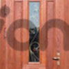 Exclusive entrance doors made of titanium with solid oak