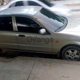 Mazda 1300 1.3 MT (60 hp) 2003