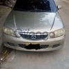 Mazda 1300 1.3 MT (60 hp) 2003