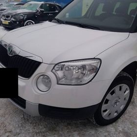 Skoda Yeti 1.2 AT (105 л.с.) 2012 г.