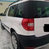 Skoda Yeti 1.2 AT (105 л.с.) 2012 г.