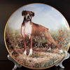 Продам фарфоровую, коллекционную тарелку с разными породами собак.