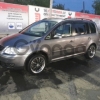 Volkswagen Touran 1.9d MT (101 л.с.) 2005 г.