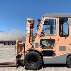 Вилковий автонавантажувач TCM з опрокидувачем вил (система для встановлення ковша)