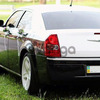 125 Chrysler 300C чорно-білий оренда авто з водієм